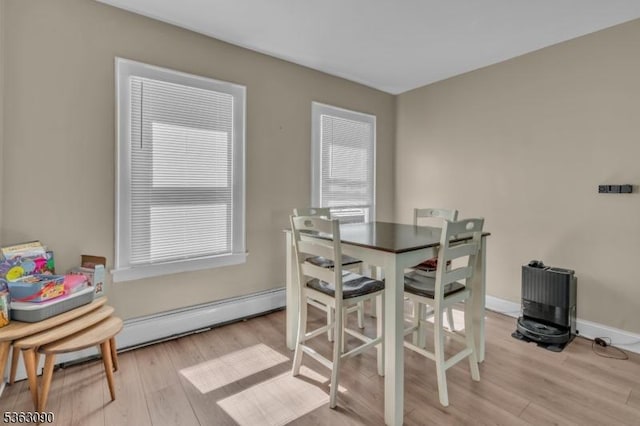 451 Centre St, Nutley Twp, NJ 07110 - dining room with light wood finished floors and baseboards