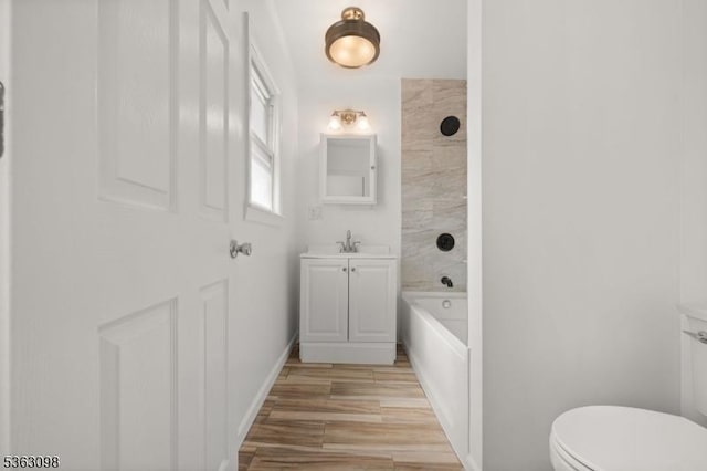 1250 Wildwood Ter, Union Twp, NJ 07083 - bathroom with vanity, washtub / shower combination, and wood finished floors