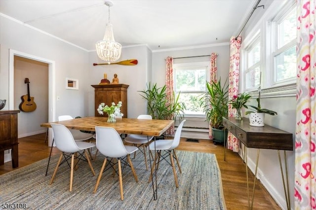 1 Walden Pl, Montclair Twp, NJ 07042 - dining space with a chandelier, ornamental molding, and wood finished floors