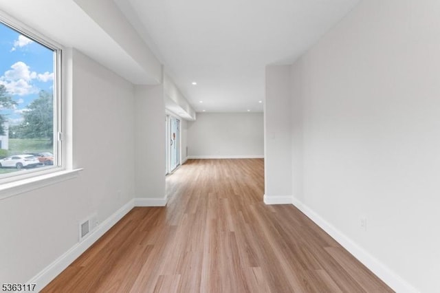 20 Beaconsfield Pl, Franklin Twp, NJ 08873 - spare room with light wood-type flooring, healthy amount of natural light, baseboards, and recessed lighting