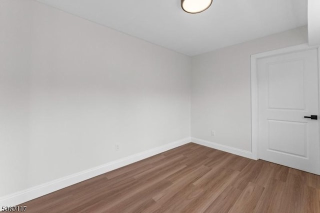 20 Beaconsfield Pl, Franklin Twp, NJ 08873 - empty room featuring wood finished floors and baseboards