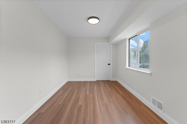 20 Beaconsfield Pl, Franklin Twp, NJ 08873 - empty room featuring light wood finished floors and baseboards