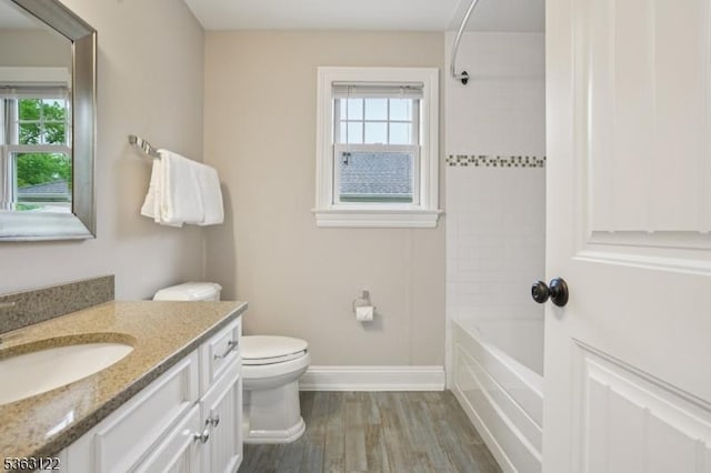 49 Summit Ave Unit B, Chatham Boro, NJ 07928 - bathroom featuring vanity, plenty of natural light, wood finished floors, and tub / shower combination