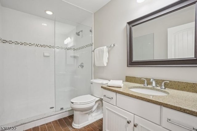 49 Summit Ave Unit B, Chatham Boro, NJ 07928 - bathroom with wood finished floors, a stall shower, and vanity