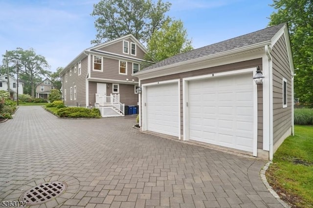 49 Summit Ave Unit B, Chatham Boro, NJ 07928 - view of front of property featuring an outdoor structure, a garage, and driveway