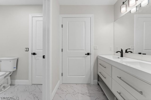 35 Amethyst Way, Franklin Twp, NJ 08823 - full bathroom with marble look tile flooring, baseboards, toilet, and double vanity