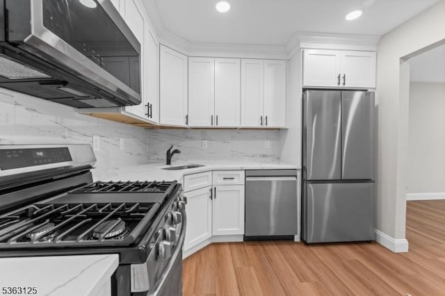 35 Amethyst Way, Franklin Twp, NJ 08823 - kitchen with appliances with stainless steel finishes, a sink, white cabinetry, and recessed lighting