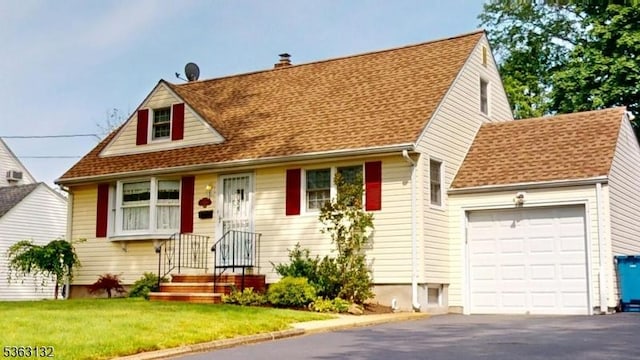 2039 Church Ave, Scotch Plains Twp, NJ 07076 - new england style home with a garage, asphalt driveway, a chimney, roof with shingles, and a front yard