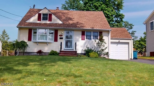 2039 Church Ave, Scotch Plains Twp, NJ 07076 - view of front of house with a front yard, asphalt driveway, and a garage