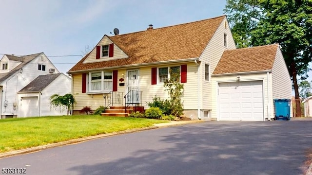 2039 Church Ave, Scotch Plains Twp, NJ 07076 - cape cod-style house with an attached garage, asphalt driveway, a front lawn, and a chimney