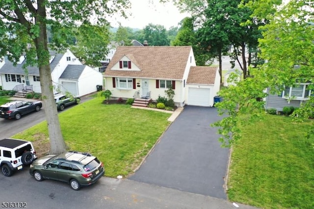 2039 Church Ave, Scotch Plains Twp, NJ 07076 - cape cod home featuring asphalt driveway, a front lawn, and an attached garage