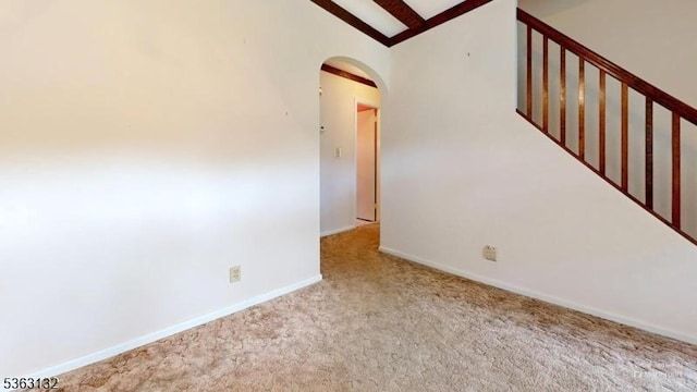 2039 Church Ave, Scotch Plains Twp, NJ 07076 - unfurnished room with arched walkways, carpet, baseboards, high vaulted ceiling, and beamed ceiling