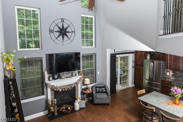 64 Pond Hollow Dr, Jefferson Twp, NJ 07438 - living area featuring dark wood-style floors, a ceiling fan, and a stone fireplace