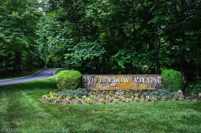 64 Pond Hollow Dr, Jefferson Twp, NJ 07438 - community sign featuring a yard