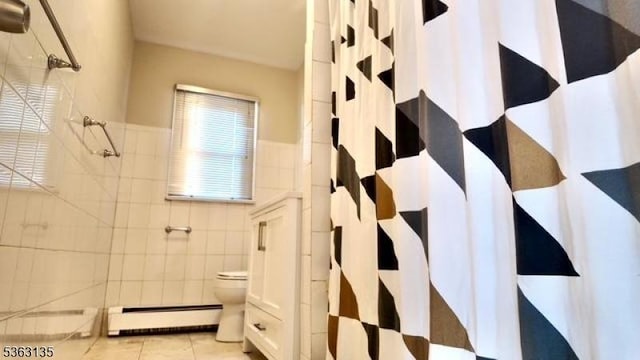 151 2nd St, Franklin Twp, NJ 08873 - full bath featuring a baseboard heating unit, tiled shower, tile patterned flooring, toilet, and tile walls