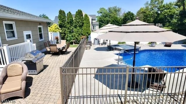151 2nd St, Franklin Twp, NJ 08873 - view of pool with a patio area, an outdoor hot tub, grilling area, and outdoor dining area