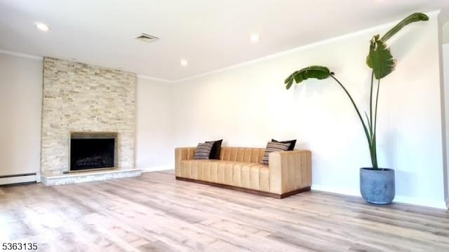 151 2nd St, Franklin Twp, NJ 08873 - living room with ornamental molding, wood finished floors, baseboards, a fireplace, and recessed lighting