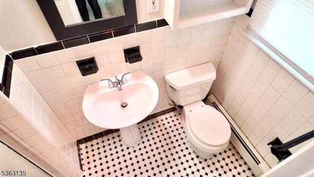 151 2nd St, Franklin Twp, NJ 08873 - bathroom with toilet, tile patterned flooring, and a sink