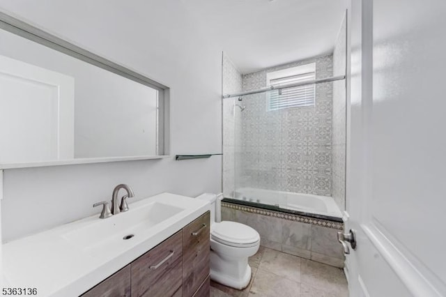 69 Summit Rd, Elizabeth City, NJ 07208 - full bath featuring tiled shower / bath combo, toilet, vanity, and tile patterned flooring