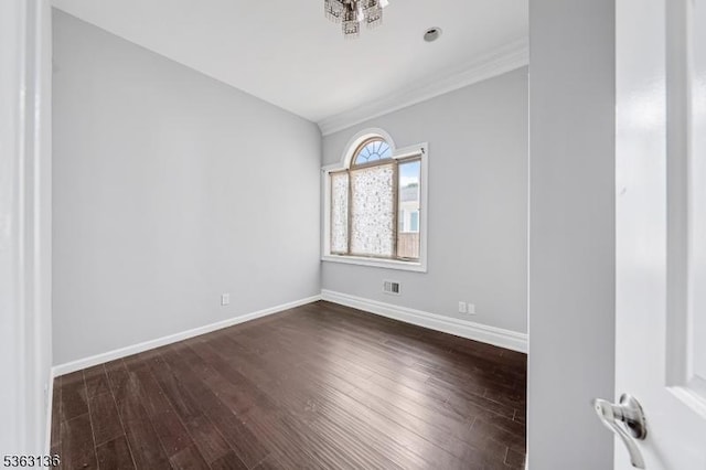 69 Summit Rd, Elizabeth City, NJ 07208 - empty room with dark wood-style flooring, crown molding, and baseboards