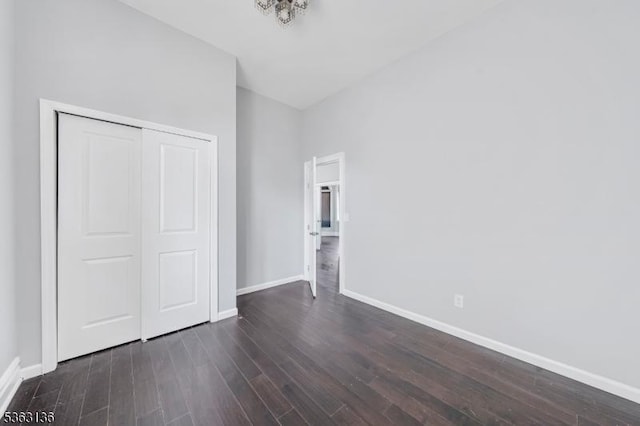 69 Summit Rd, Elizabeth City, NJ 07208 - unfurnished bedroom featuring dark wood-type flooring, baseboards, and a closet