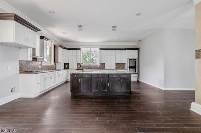 69 Summit Rd, Elizabeth City, NJ 07208 - kitchen featuring dark wood-style floors, a sink, baseboards, and ornamental molding
