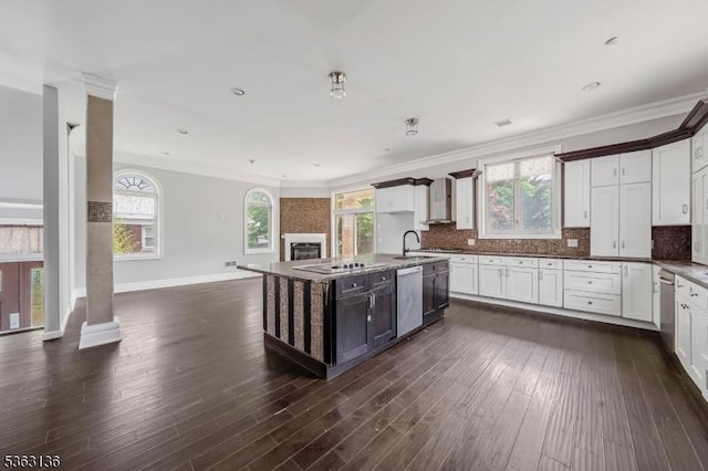 69 Summit Rd, Elizabeth City, NJ 07208 - kitchen featuring stainless steel dishwasher, a sink, open floor plan, dark wood finished floors, and healthy amount of natural light