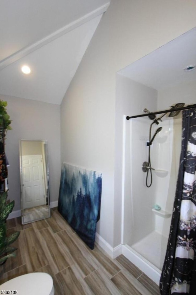 132 Sloop Rd, Stafford Twp, NJ 08050 - full bath with a shower stall, wood finished floors, recessed lighting, baseboards, and vaulted ceiling