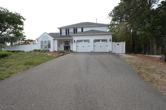 132 Sloop Rd, Stafford Twp, NJ 08050 - traditional-style house with driveway and a garage