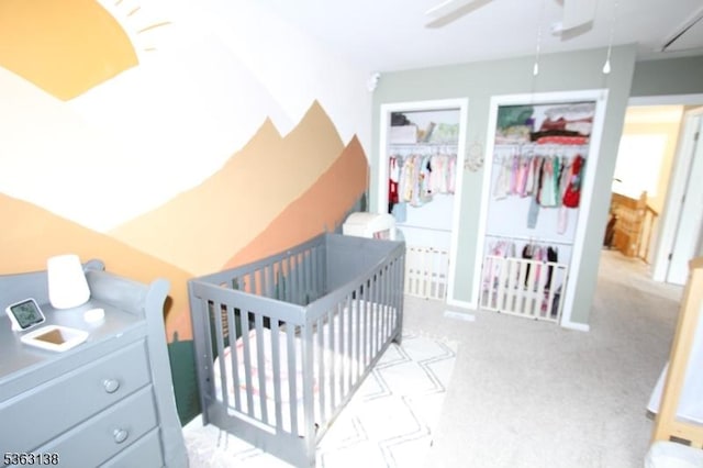 132 Sloop Rd, Stafford Twp, NJ 08050 - carpeted bedroom featuring attic access, a crib, and ceiling fan