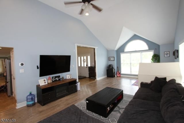 132 Sloop Rd, Stafford Twp, NJ 08050 - living area with ceiling fan, lofted ceiling, plenty of natural light, and wood finished floors