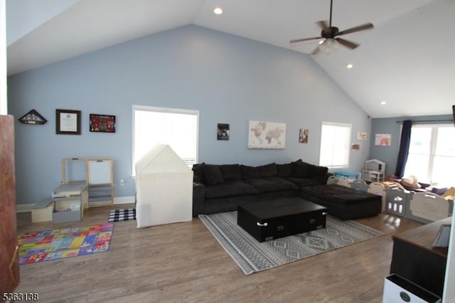 132 Sloop Rd, Stafford Twp, NJ 08050 - living room with high vaulted ceiling, a ceiling fan, wood finished floors, and recessed lighting