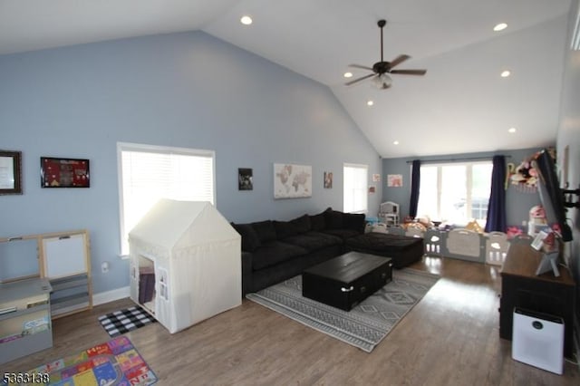 132 Sloop Rd, Stafford Twp, NJ 08050 - living area with high vaulted ceiling, a ceiling fan, wood finished floors, and recessed lighting