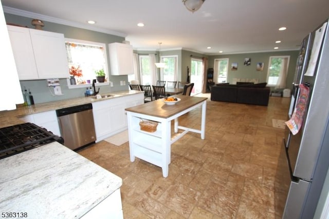 132 Sloop Rd, Stafford Twp, NJ 08050 - kitchen with dishwasher, crown molding, open floor plan, white cabinets, and recessed lighting