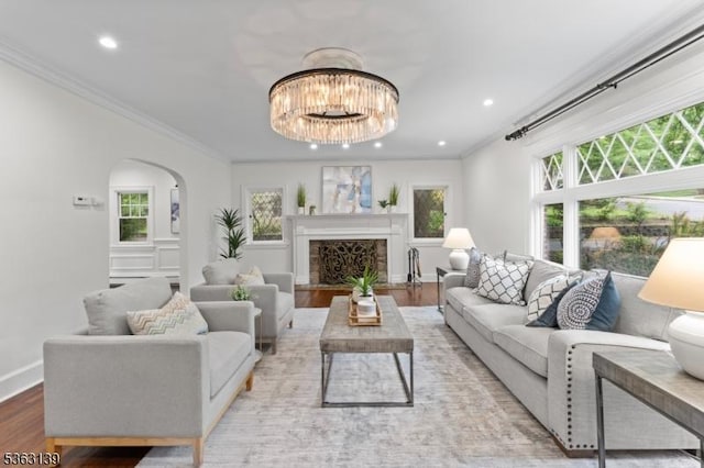 460 Overhill Rd, South Orange Village Twp, NJ 07079 - living area featuring arched walkways, wood finished floors, a chandelier, recessed lighting, and ornamental molding