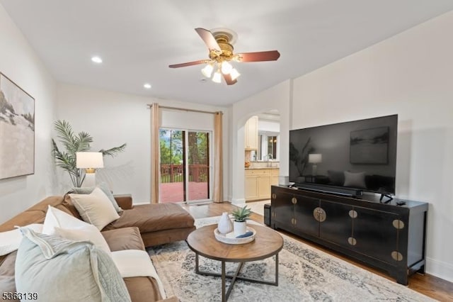 460 Overhill Rd, South Orange Village Twp, NJ 07079 - living room featuring arched walkways, light wood-type flooring, a ceiling fan, recessed lighting, and baseboards