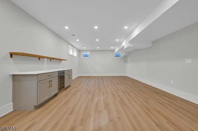 29 N Hillside Ave, Chatham Boro, NJ 07928 - indoor dry bar with wine cooler, light wood finished floors, and recessed lighting