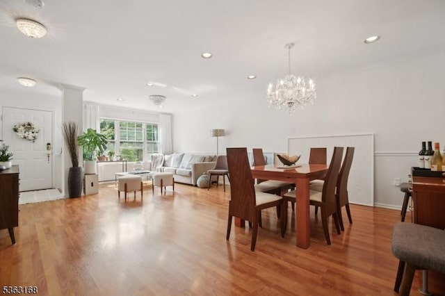 157 Rock Rd, Wayne Twp, NJ 07470 - dining area featuring light wood-style flooring, recessed lighting, and a chandelier