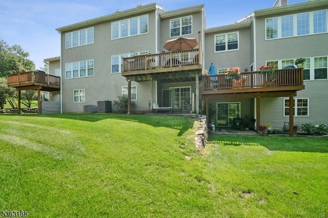 157 Rock Rd, Wayne Twp, NJ 07470 - rear view of property with a deck, central AC, and a lawn