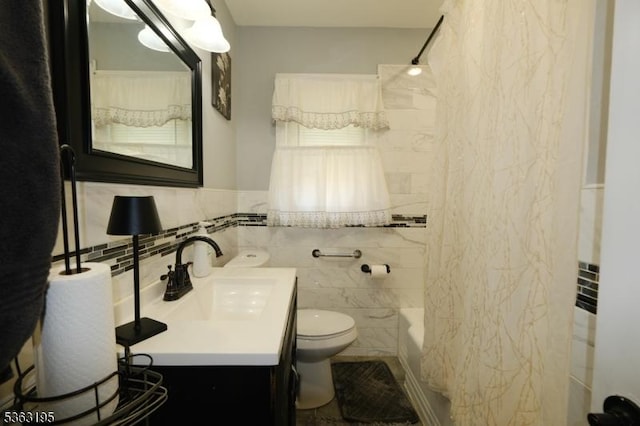 179 Standish St, Elizabeth City, NJ 07202 - full bath featuring tile walls, vanity, toilet, and shower / washtub combination