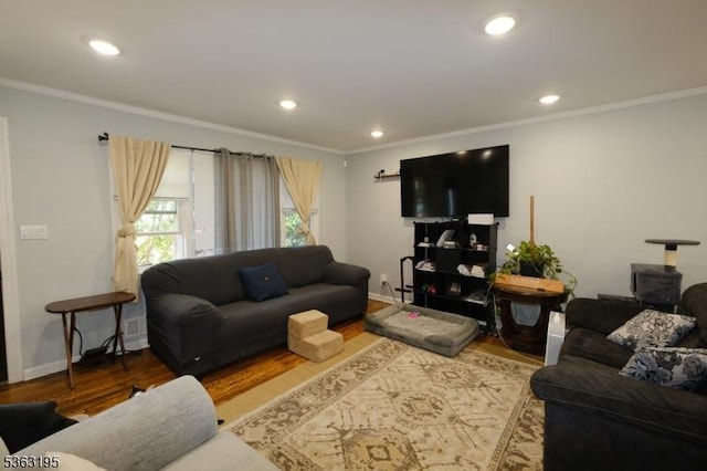 179 Standish St, Elizabeth City, NJ 07202 - living area with wood finished floors, ornamental molding, baseboards, and recessed lighting