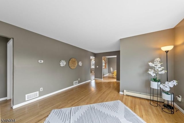304 Lilac Ct, Bridgewater Twp, NJ 08807 - unfurnished living room with wood finished floors and baseboards