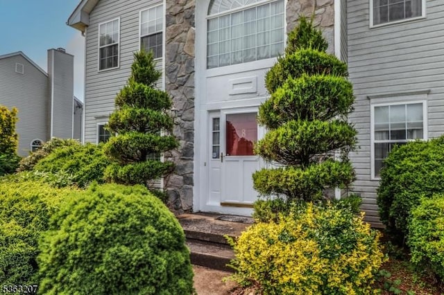 8 Staudt Ct, Franklin Twp, NJ 08873 - view of exterior entry featuring stone siding