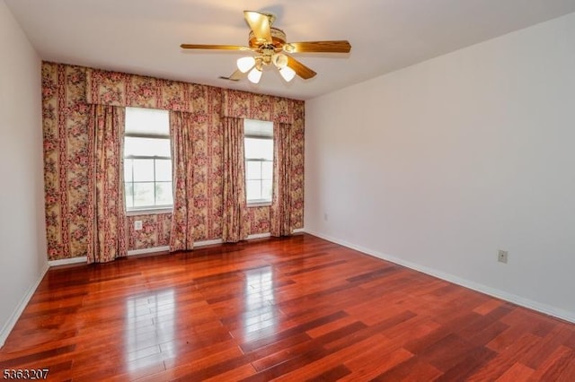 8 Staudt Ct, Franklin Twp, NJ 08873 - unfurnished room featuring wood finished floors, a ceiling fan, baseboards, and wallpapered walls