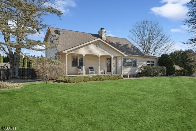 9 Highview Dr, Vernon Twp, NJ 07460 - back of house with covered porch, a chimney, and a shingled roof