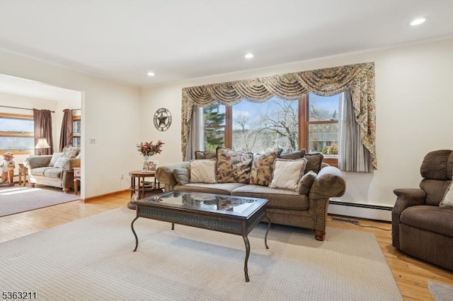 9 Highview Dr, Vernon Twp, NJ 07460 - living room with a baseboard radiator, healthy amount of natural light, recessed lighting, light wood-style floors, and crown molding
