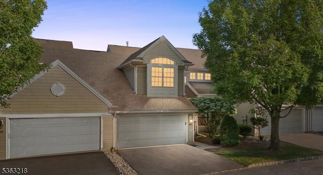 133 Marlboro Cir, Lopatcong Twp, NJ 08886 - view of front of house featuring driveway, a garage, and roof with shingles