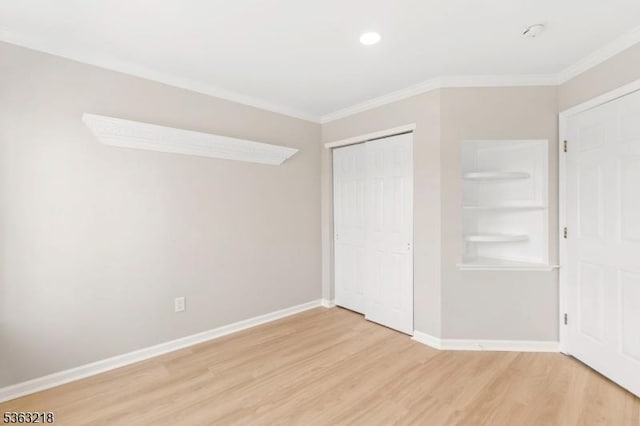 133 Marlboro Cir, Lopatcong Twp, NJ 08886 - unfurnished bedroom with light wood-style flooring, ornamental molding, baseboards, and a closet