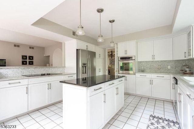 21 Stafford Ln, Bedminster Twp, NJ 07921 - kitchen featuring stainless steel appliances, a kitchen island, tasteful backsplash, and light tile patterned floors