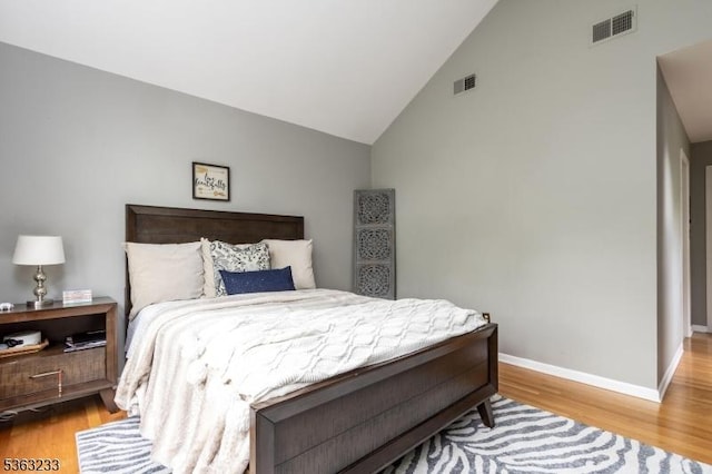 21 Stafford Ln, Bedminster Twp, NJ 07921 - bedroom with wood finished floors, baseboards, and high vaulted ceiling